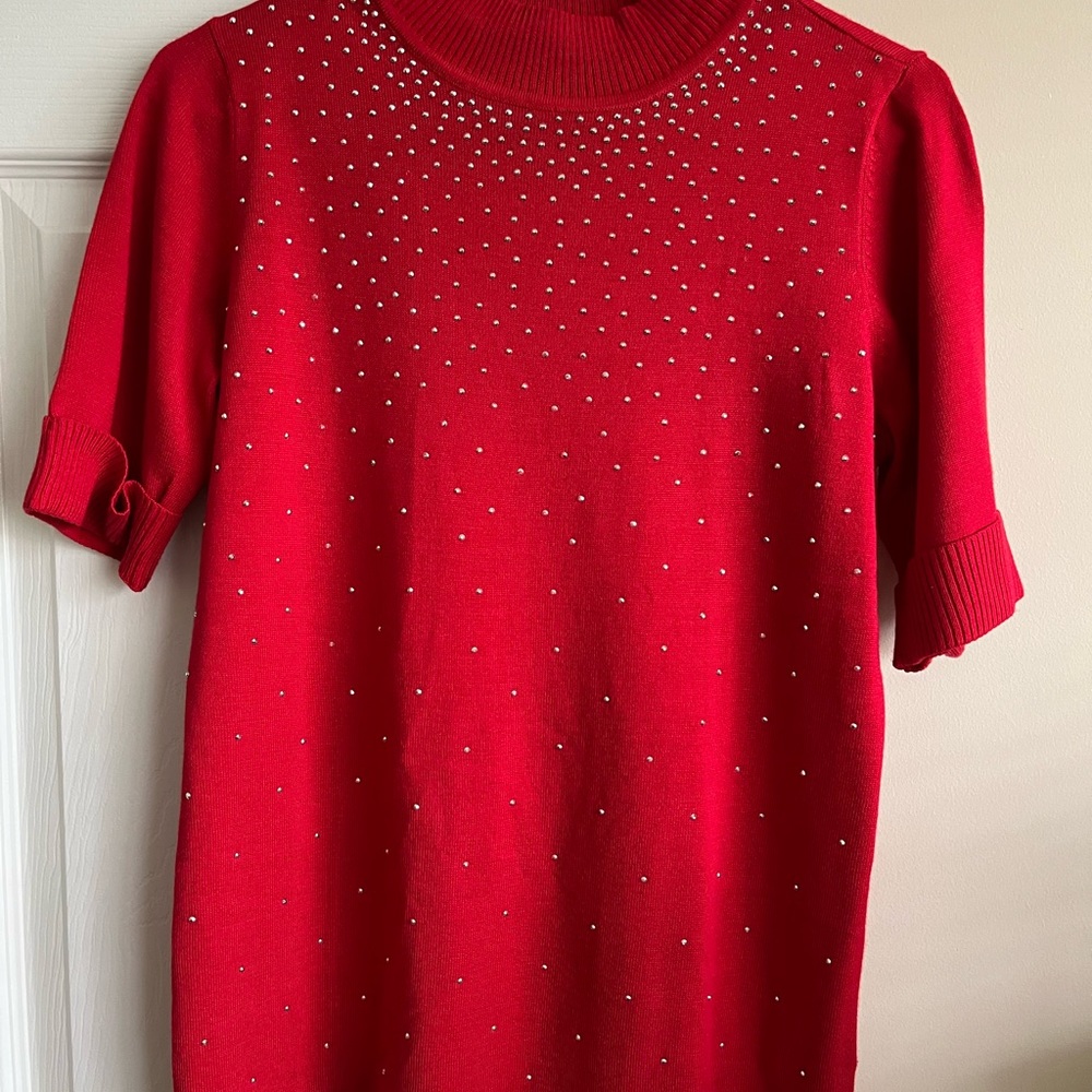BY DESIGN